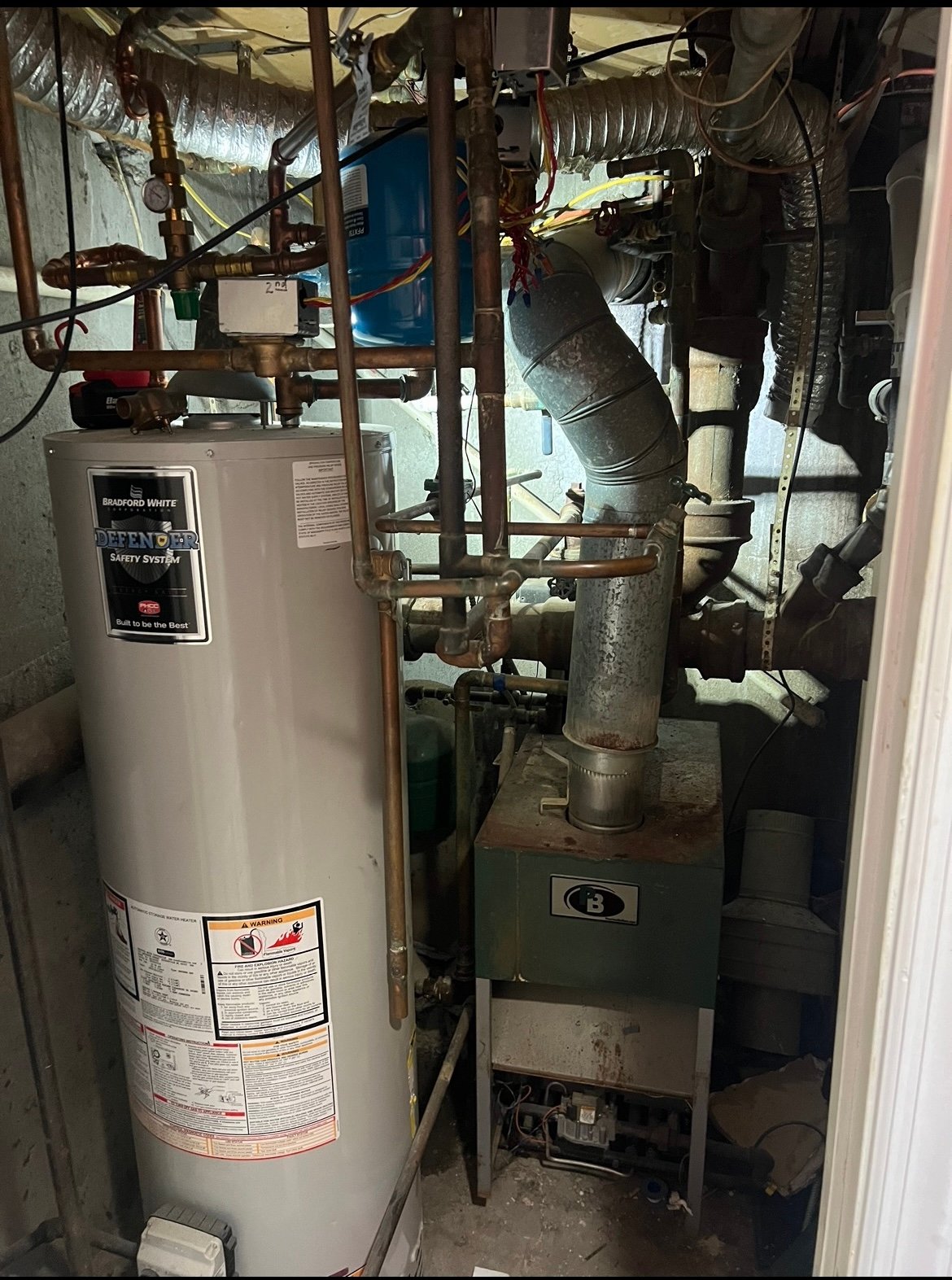 Aging boiler and water heater system repair